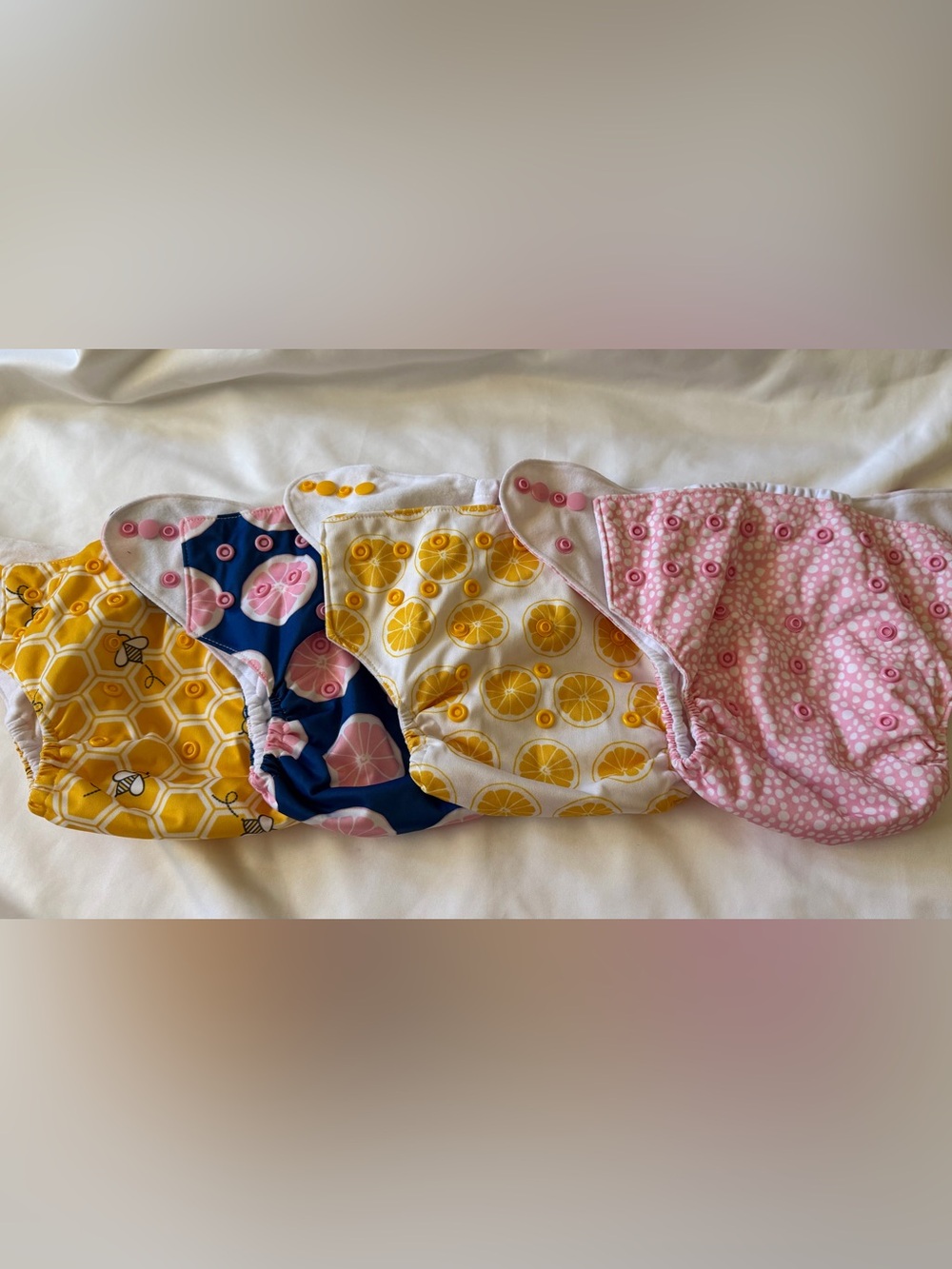 Nora’s Nursery cloth diapers lot 4 (pocket shells + bamboo inserts) Citrus bee